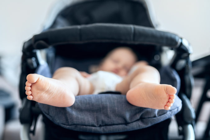 Baby in Kinderwagen